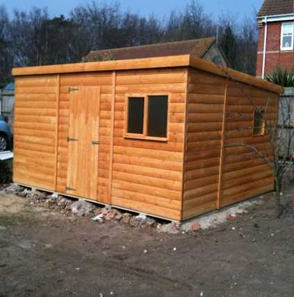 large rubber roofed cube shed